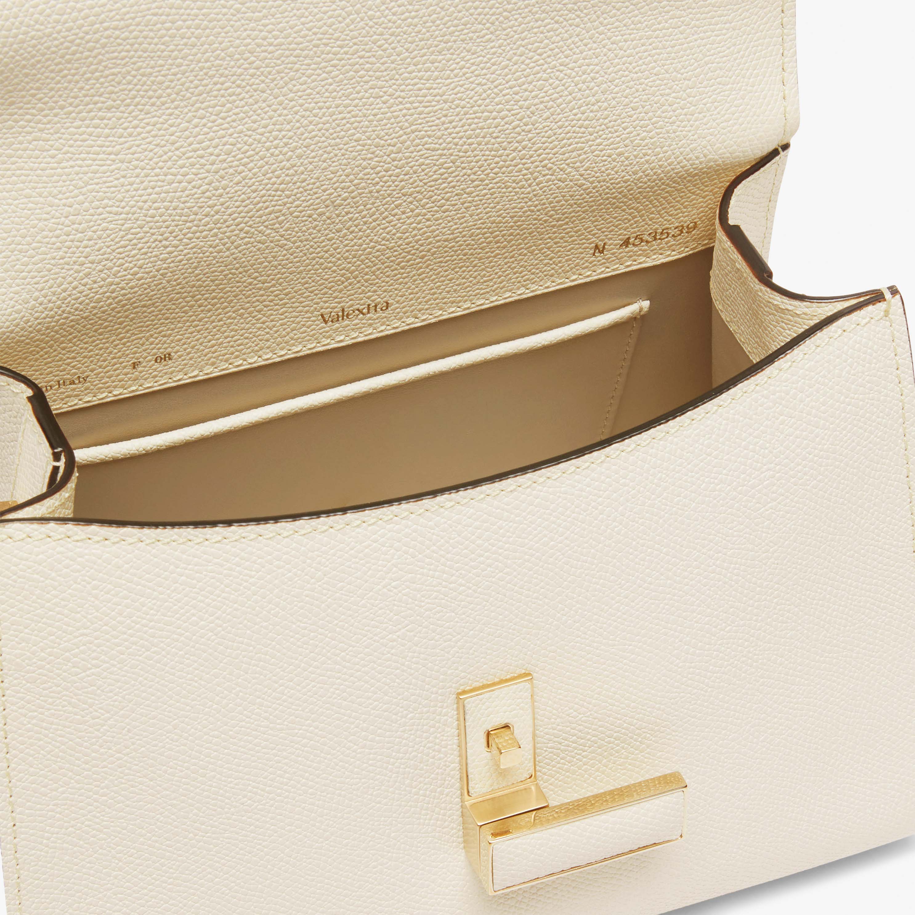 Iside: White Leather Mini top handle bag | Valextra